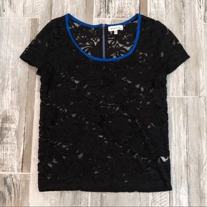 Black lace top with blue trim